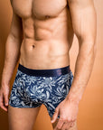 Men's bamboo underwear featuring white protea and waratah flowers on a navy background