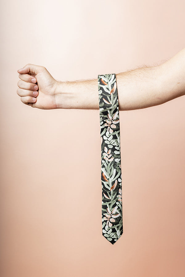 Stylish cotton tie showcasing a vibrant protea design in green, ideal for formal occasions and nature lovers